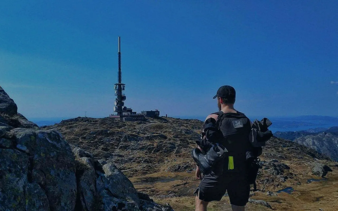 Rucker looking toward a mountain communications tower